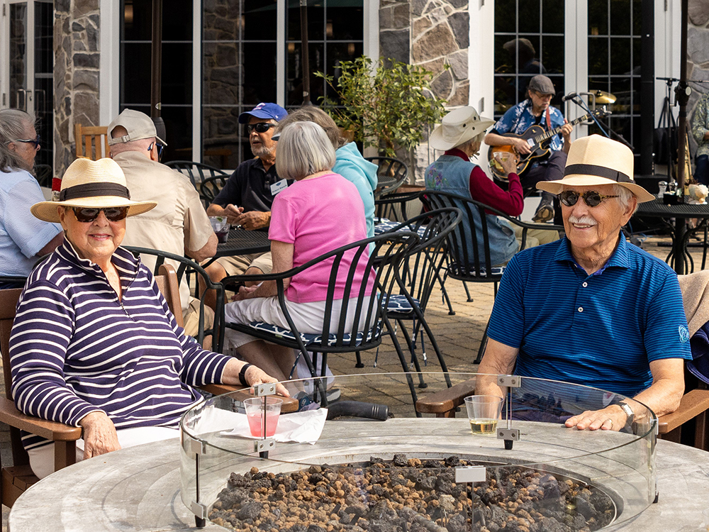 Senior couple sitting on a couch together