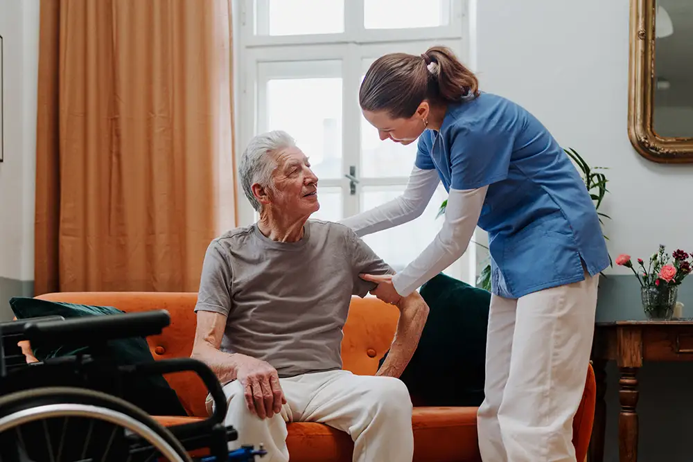 Senior couple sitting on a couch together